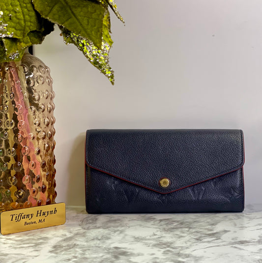 Authentic Louis Vuitton Empreinte Sarah Wallet in Marine Rouge