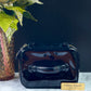 Authentic CHANEL Vanity Cosmetic Case crafted of Black Patent Leather