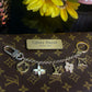 Authentic Fleur De Monogram Bag Charm Chain